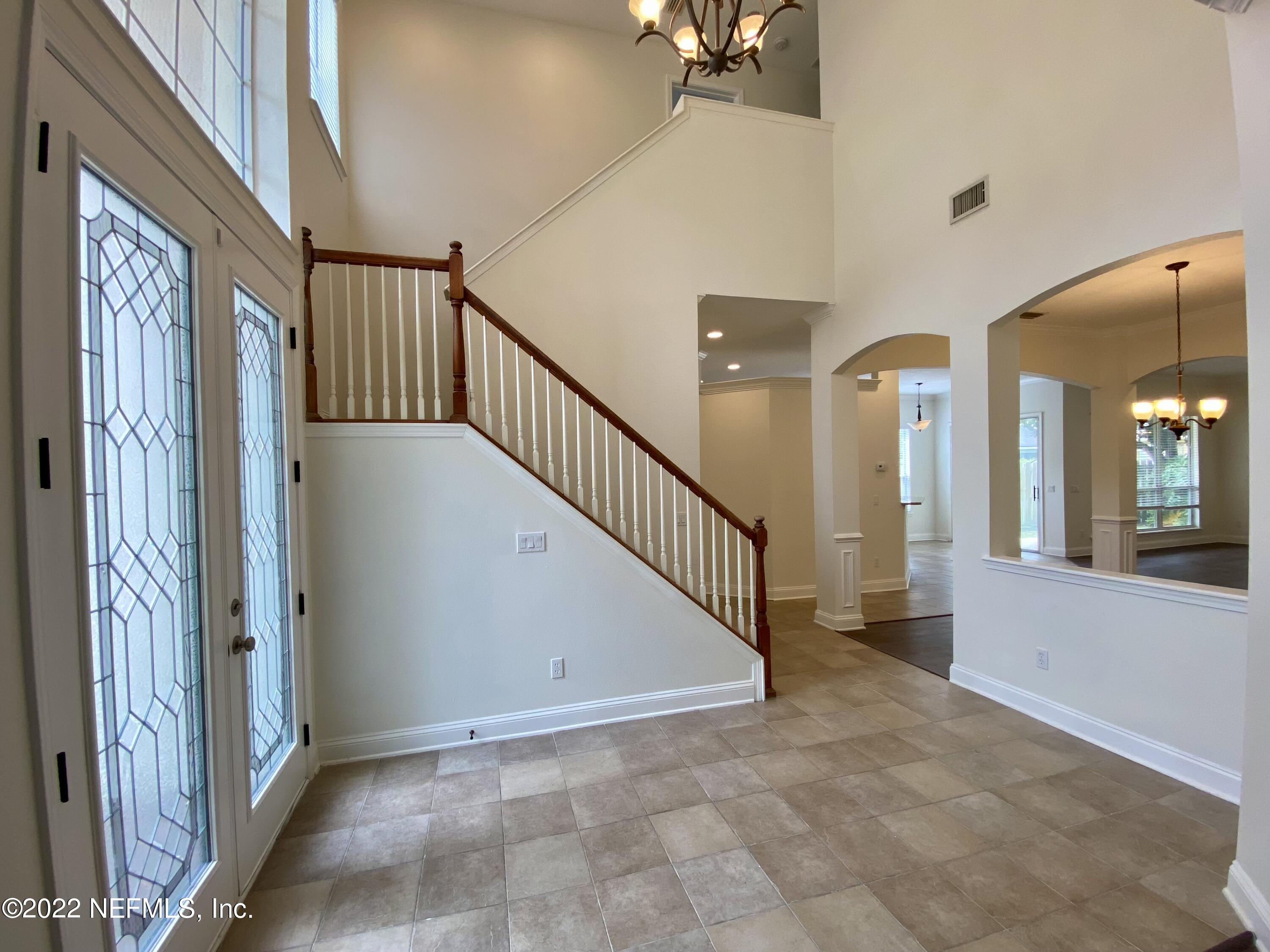 1648 Summerdown Way St. Johns, FL 32259 - Photo 2 of 14 a view of an entryway with staircase