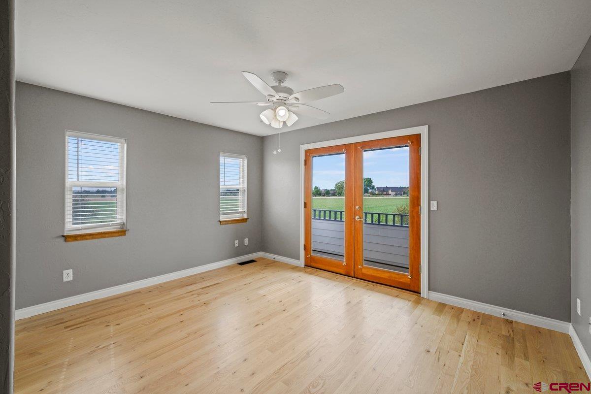 13902 5950th Road Montrose, CO 81403 - Photo 17 of 35 a view of an empty room with a window