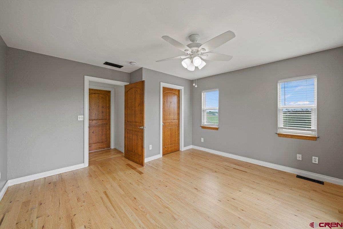 13902 5950th Road Montrose, CO 81403 - Photo 21 of 35 a view of an empty room with a window