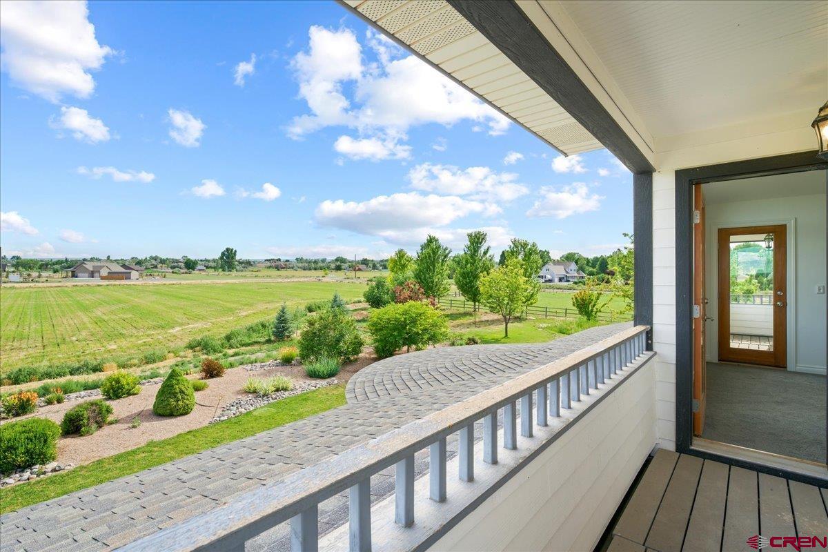 13902 5950th Road Montrose, CO 81403 - Photo 32 of 35 a view of a balcony with an ocean view