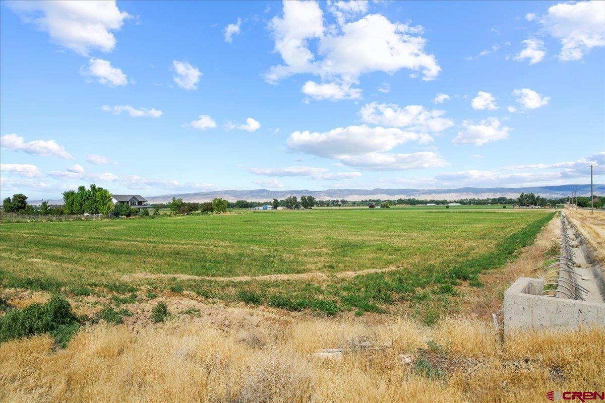 13902 5950th Road Montrose, CO 81403 - Photo 35 of 35 a view of a lake with a big yard