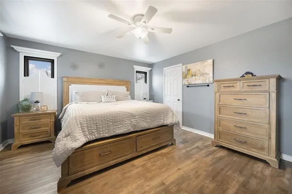 a kitchen with sink cabinets and window