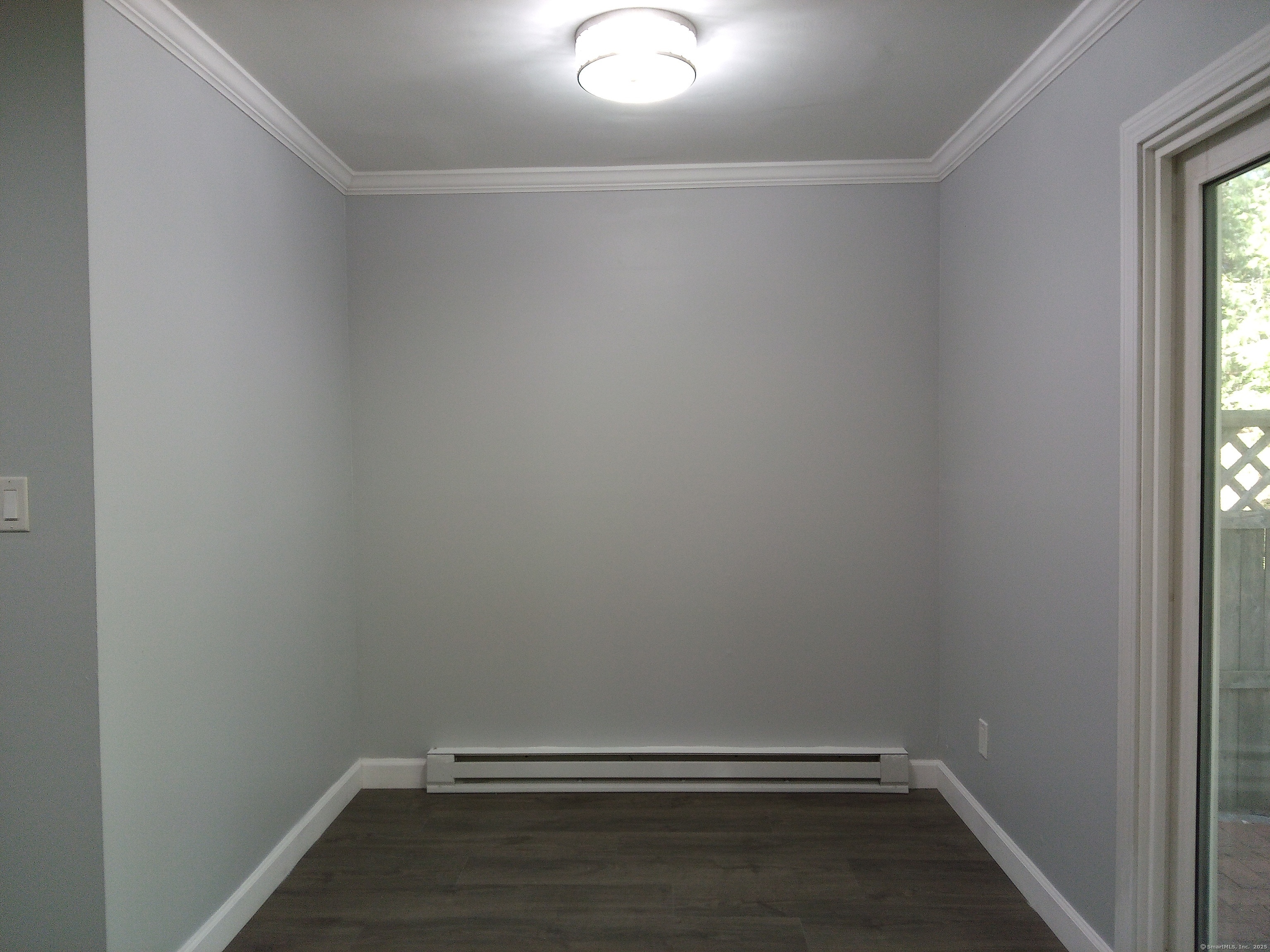 74 Washington Road, Unit 16 Woodbury, CT 06798 - Photo 13 of 25 a view of room with racks on the wall