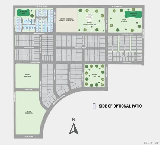 a front view of a house with a big yard and potted plants
