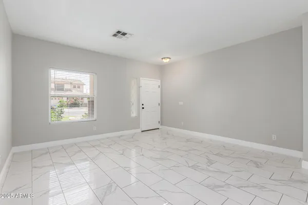 a view of an empty room with window