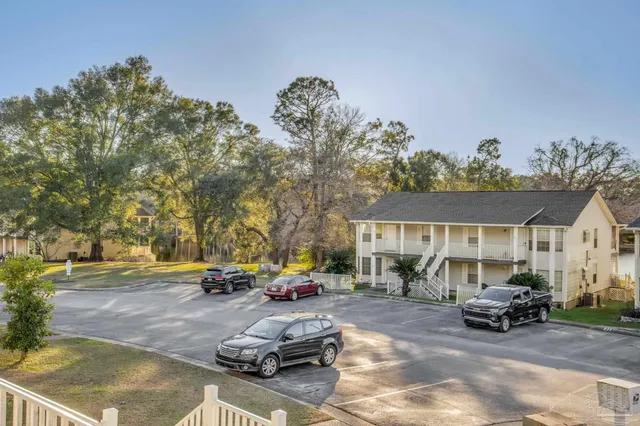 a view of a lake with a building in the background