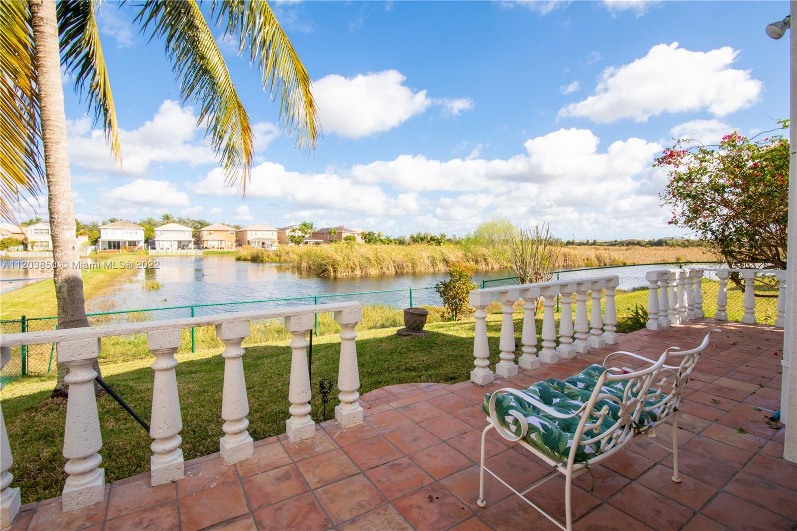 14821 Southwest 20th Street Miramar, FL 33027 - Photo 19 of 50 a view of a chairs and table on the terrace
