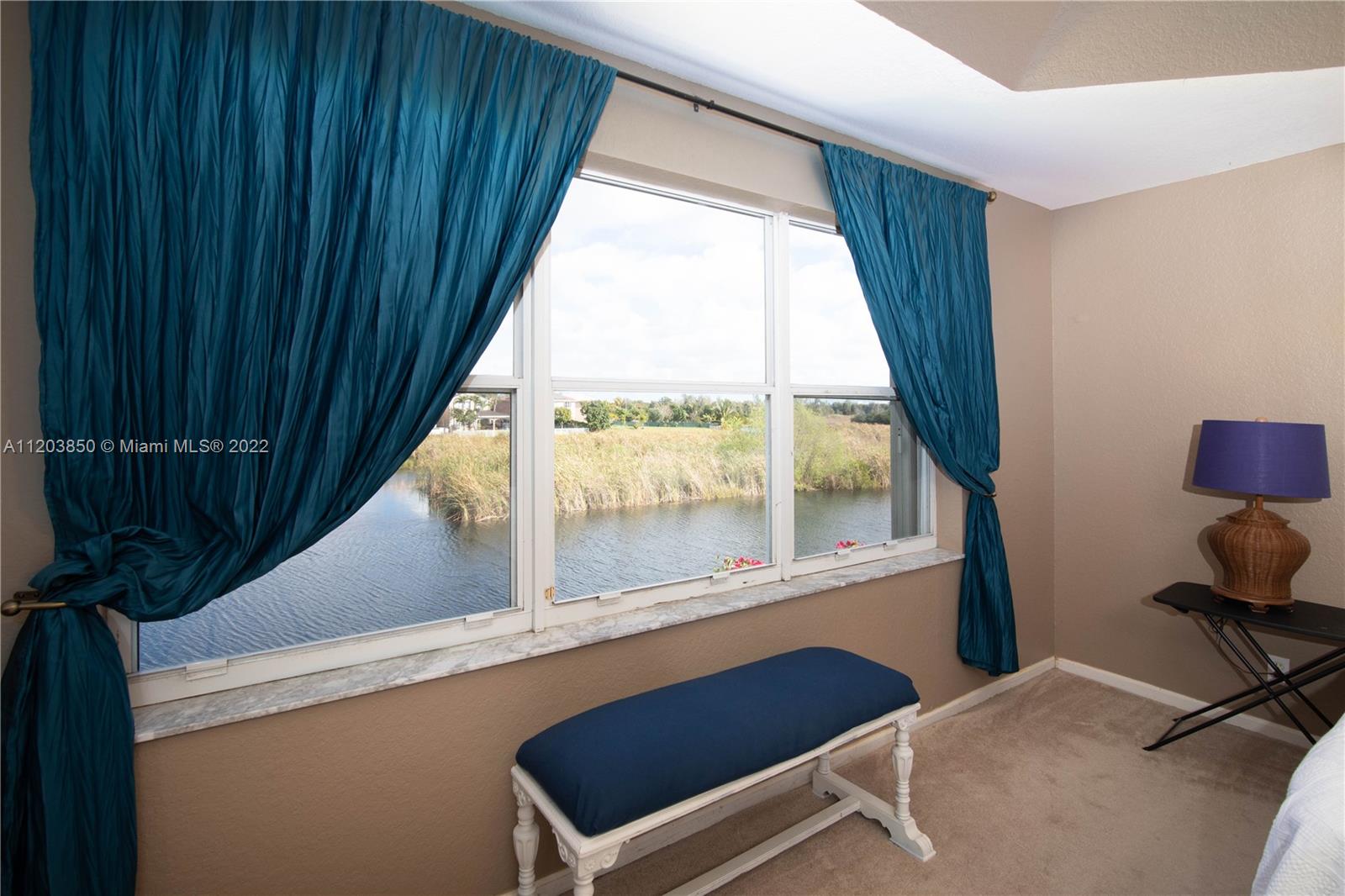 14821 Southwest 20th Street Miramar, FL 33027 - Photo 27 of 50 a room with furniture and a window
