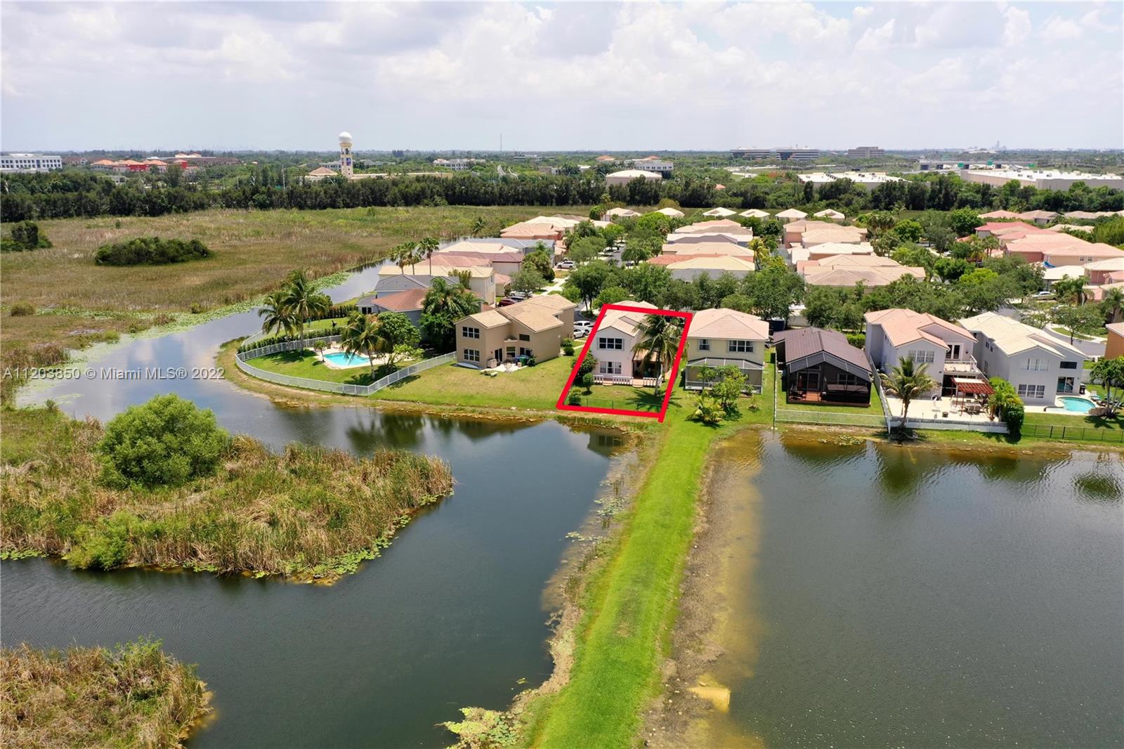 14821 Southwest 20th Street Miramar, FL 33027 - Photo 47 of 50 an aerial view of a house with a lake view