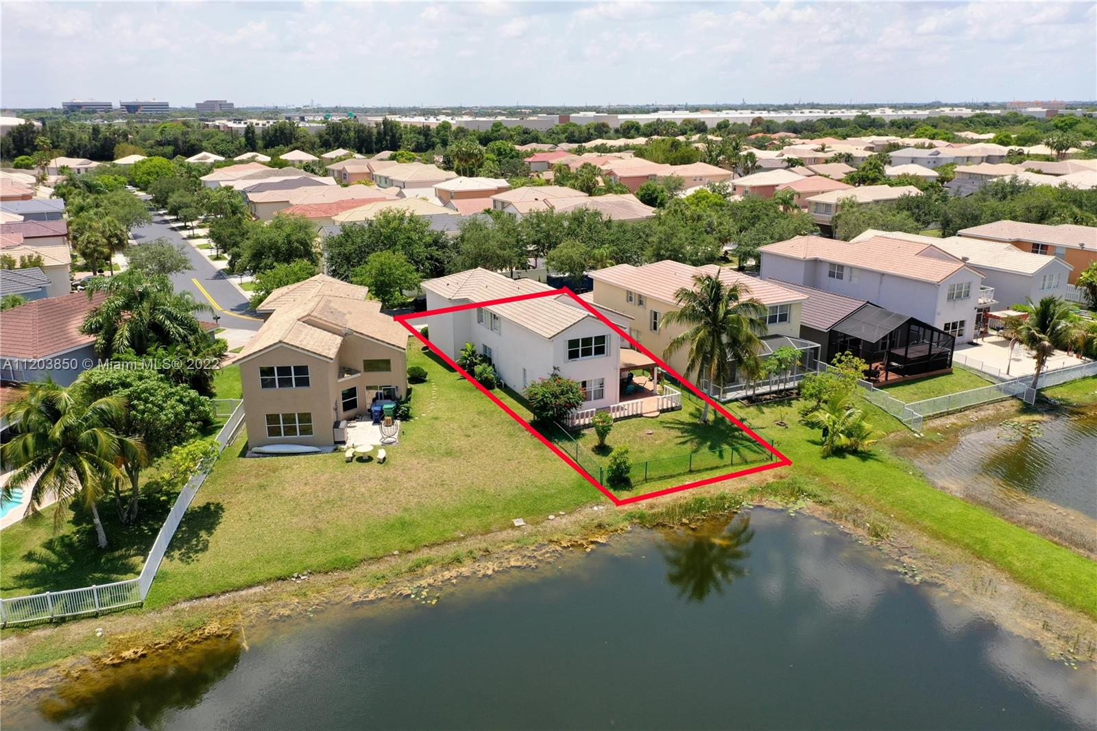 14821 Southwest 20th Street Miramar, FL 33027 - Photo 49 of 50 an aerial view of residential houses with outdoor space