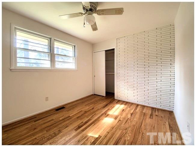 3309 Leonard Street Raleigh, NC 27607 - Photo 12 of 21 a view of an empty room with a window