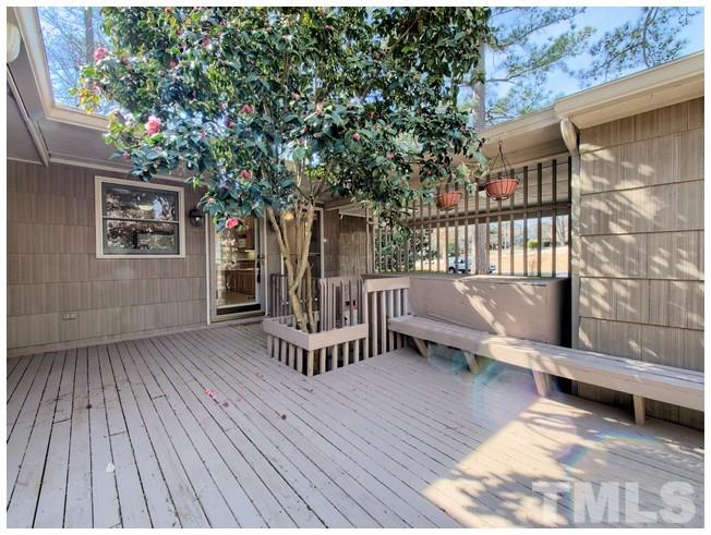 3309 Leonard Street Raleigh, NC 27607 - Photo 15 of 21 a view of a roof deck with wooden fence and a bench