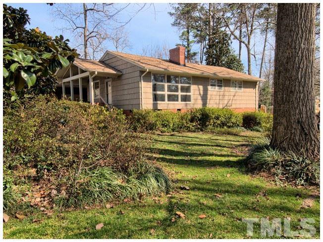 3309 Leonard Street Raleigh, NC 27607 - Photo 17 of 21 a front view of a house with a garden
