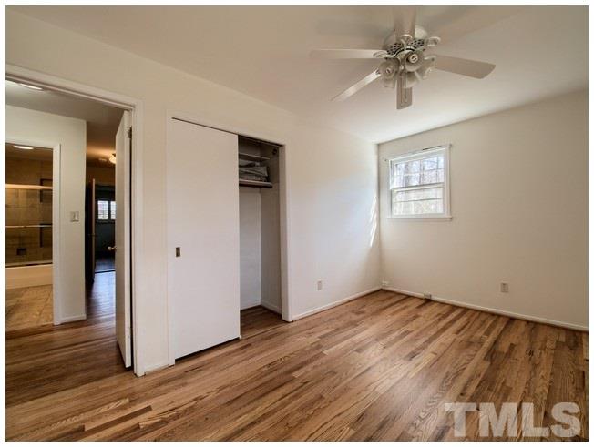 3309 Leonard Street Raleigh, NC 27607 - Photo 10 of 21 a view of an empty room with wooden floor