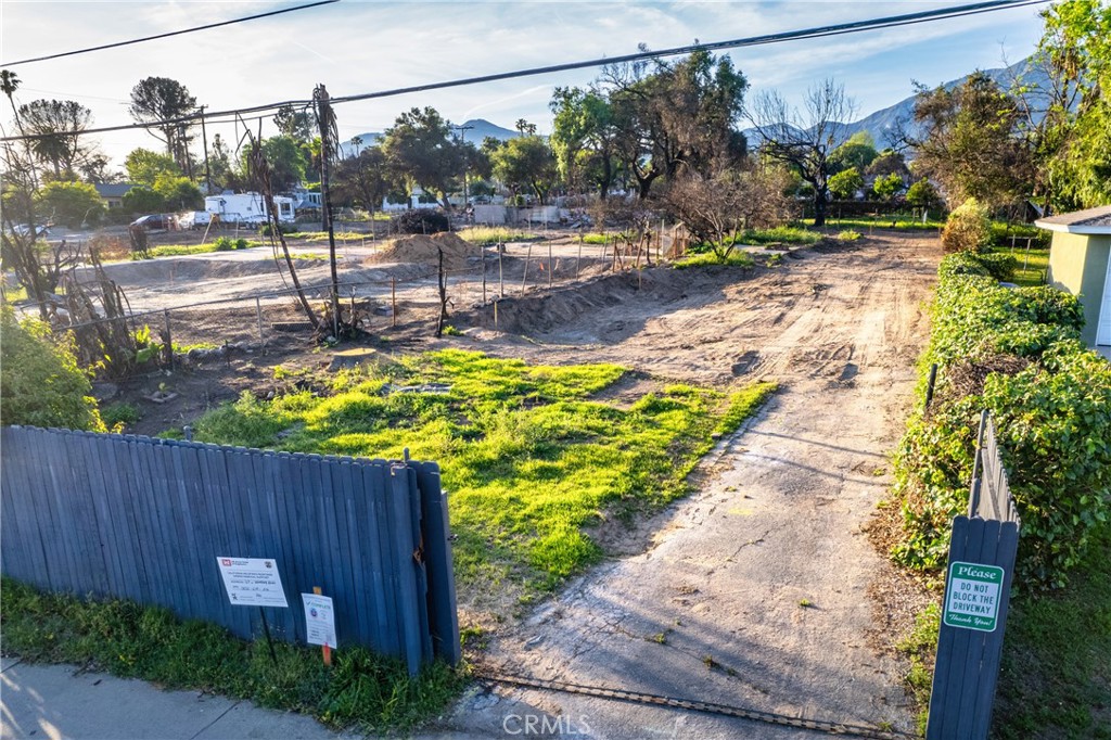 169 West Woodbury Road Altadena, CA 91001 - Photo 3 of 8 a view of a swimming pool with a patio
