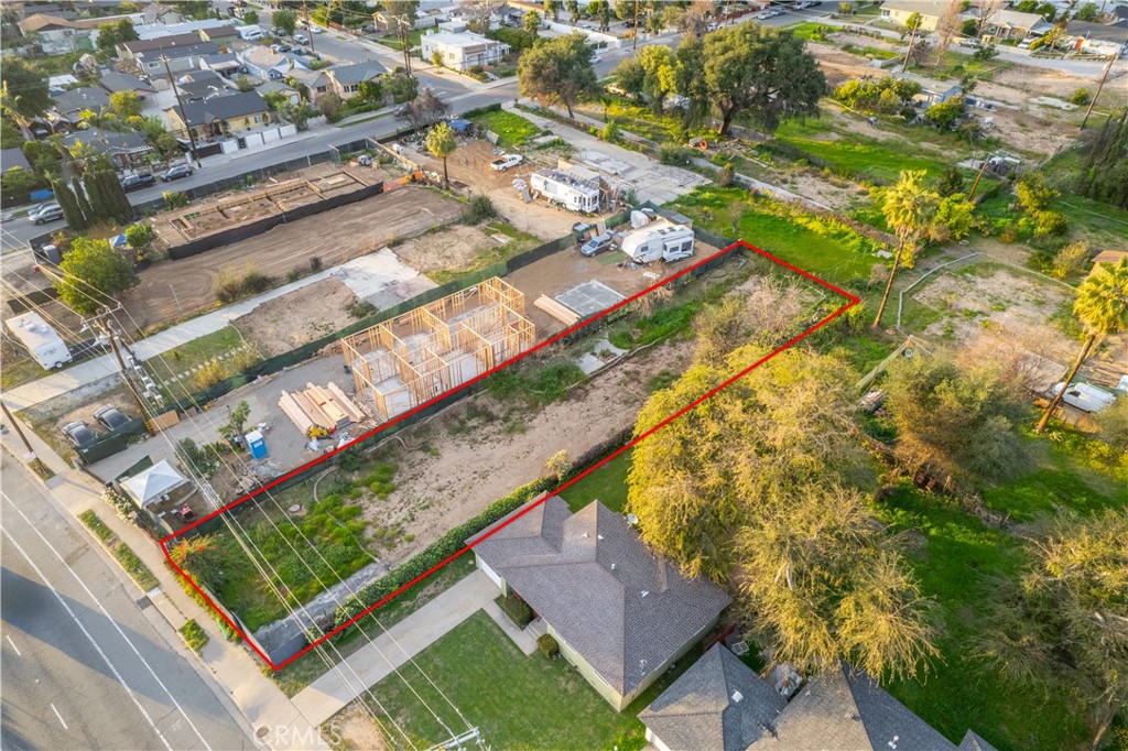 169 West Woodbury Road Altadena, CA 91001 - Photo 6 of 8 an aerial view of a residential apartment building with a yard