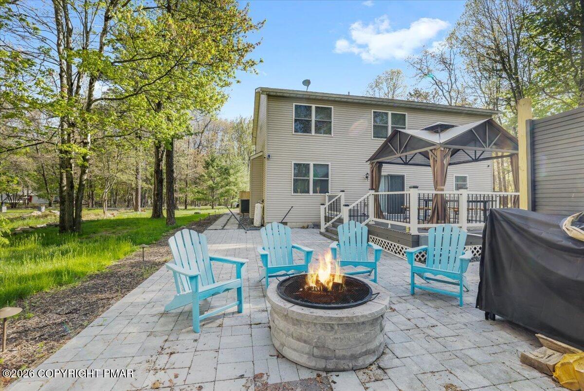 3223 Willow Grove Road Pocono Summit, PA 18346 - Photo 31 of 34 Patio / Fire Pit