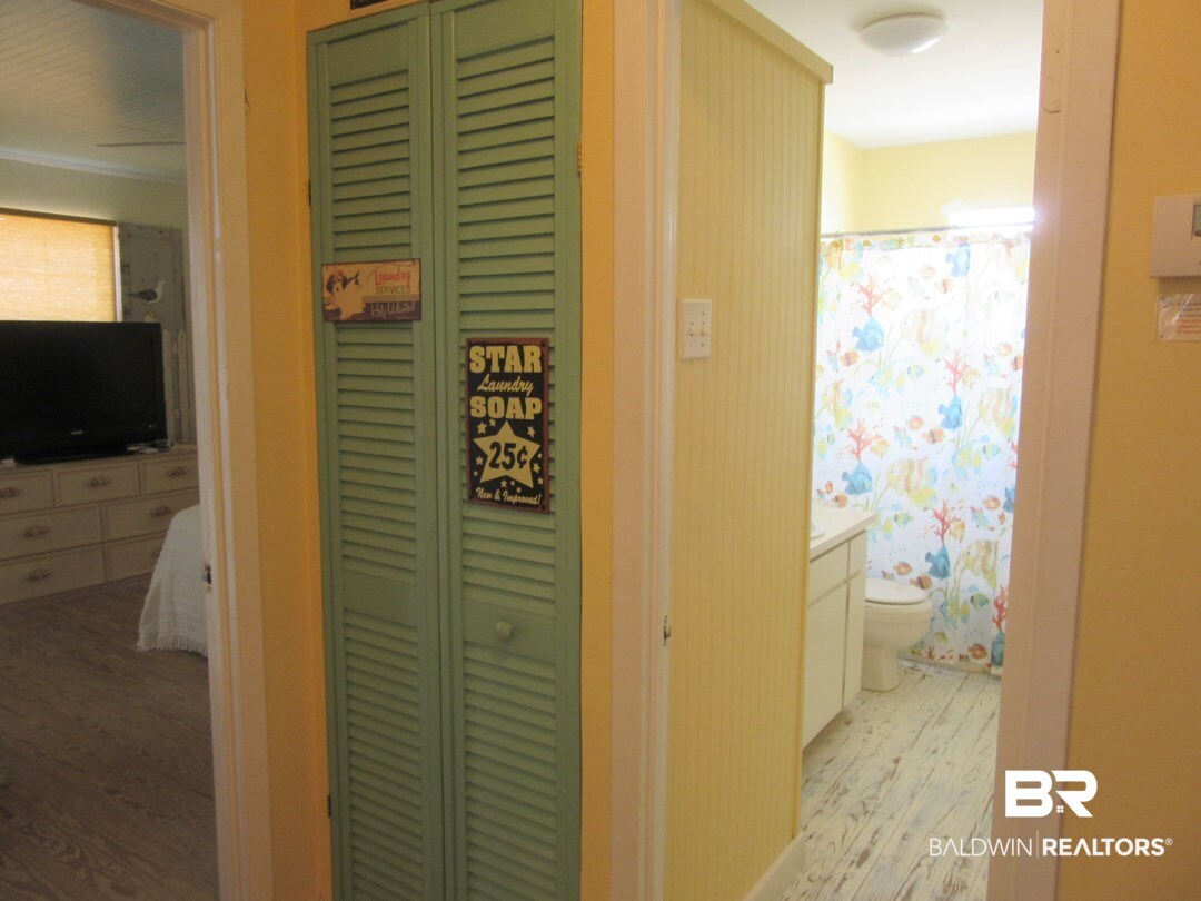 574 Our Road Gulf Shores, AL 36542 - Photo 22 of 32 Hall to Full Bath