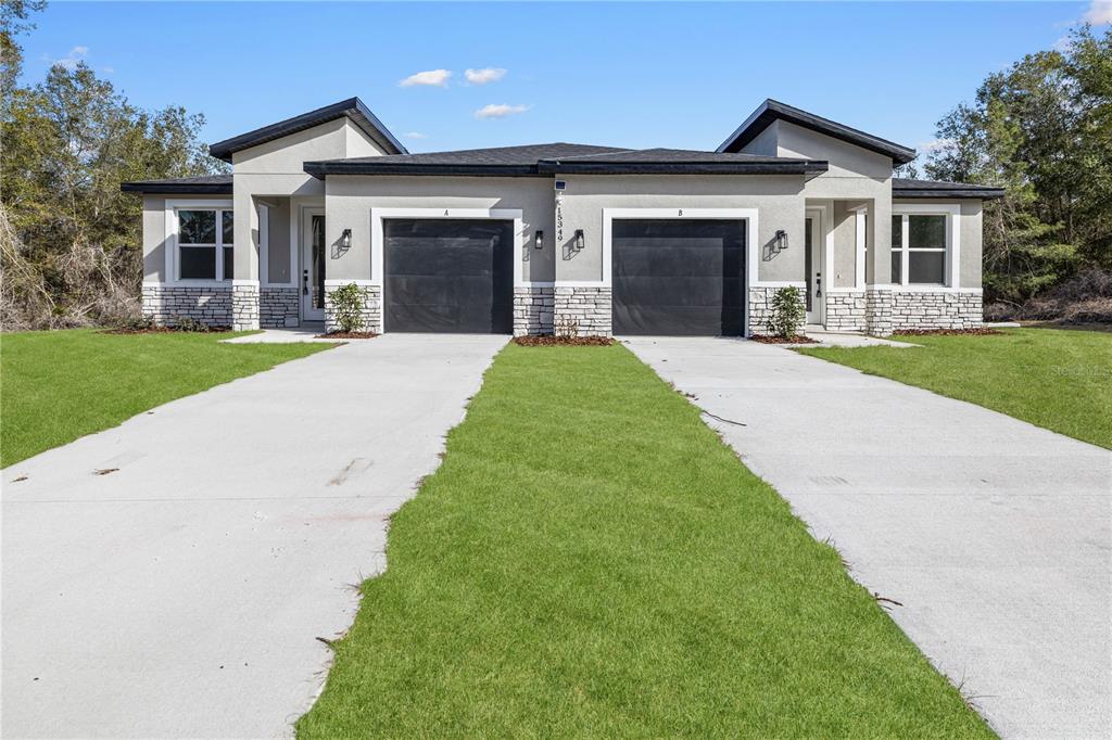 front view of a house and a yard