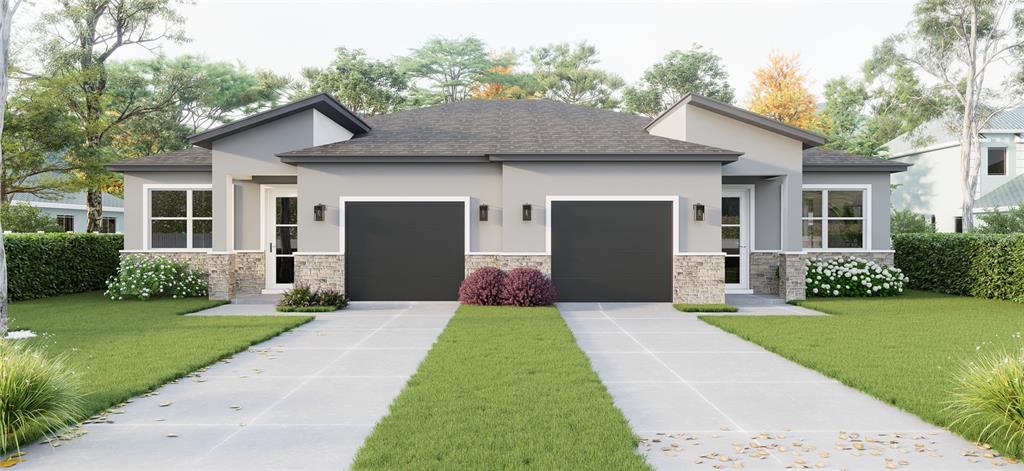 a front view of house with yard and green space