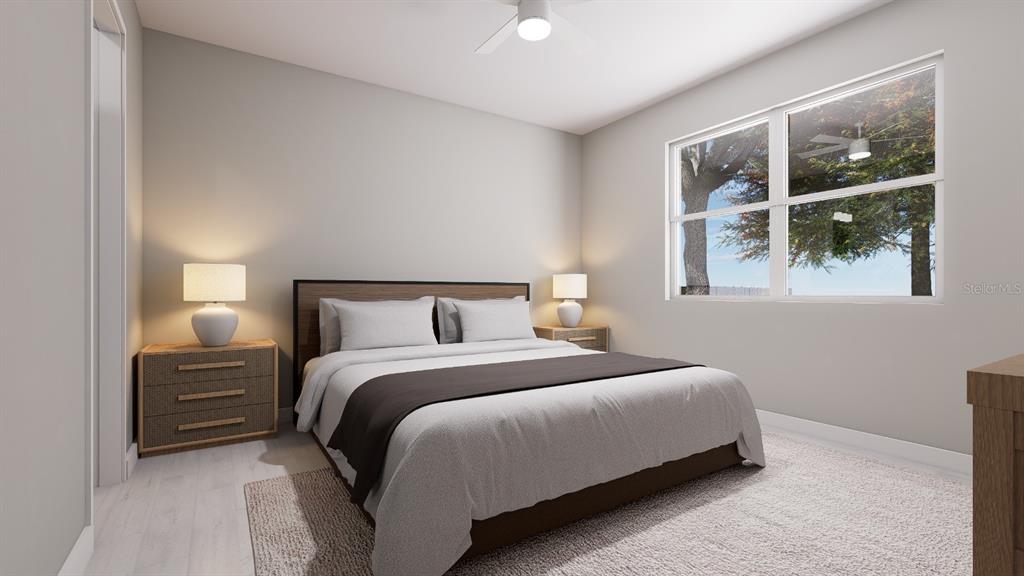 15349 Southwest 29th Terrace Road Ocala, FL 34473 - Photo 4 of 6 a bedroom with bed and a window