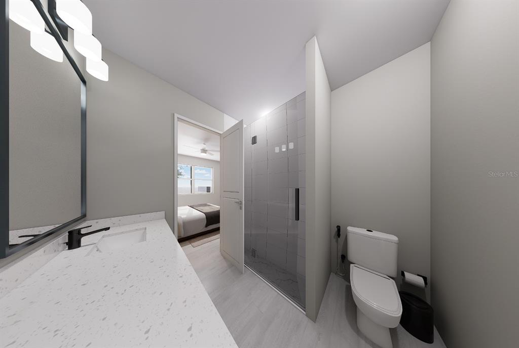 15349 Southwest 29th Terrace Road Ocala, FL 34473 - Photo 6 of 6 a bathroom with a toilet sink and mirror