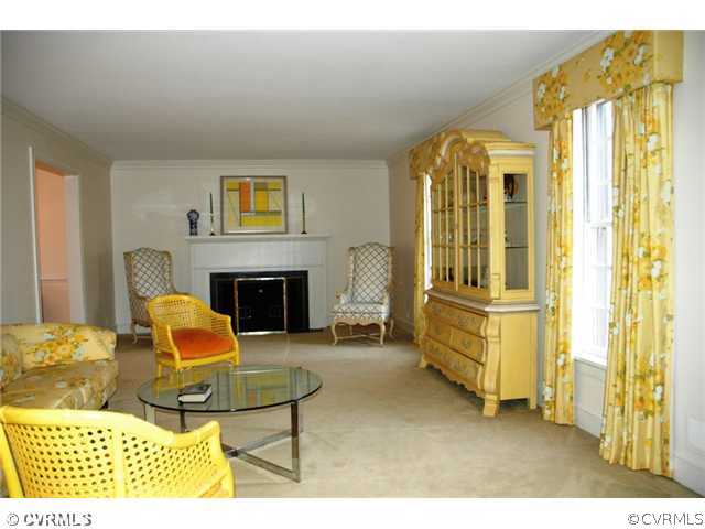 10319 Cherokee Road Richmond, VA 23235 - Photo 4 of 12 a living room with furniture and a fireplace