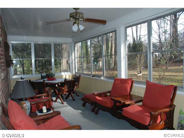 10319 Cherokee Road Richmond, VA 23235 - Photo 10 of 12 a living room with furniture and a large window