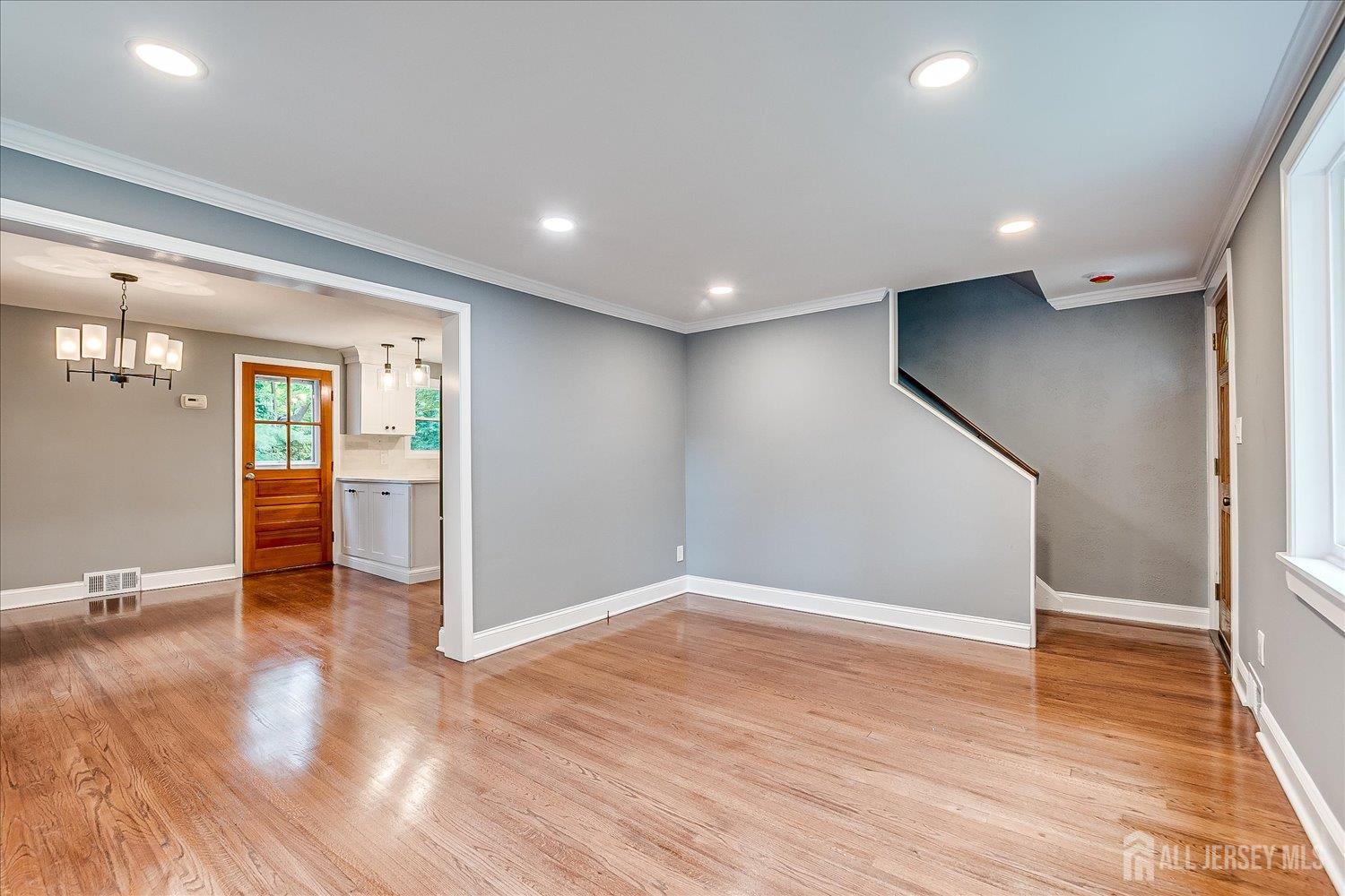32 Kate Lane Metuchen, NJ 08840 - Photo 8 of 31 wooden floor in an empty room with a window