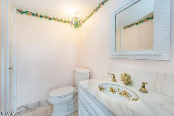 a bathroom with a sink and a toilet