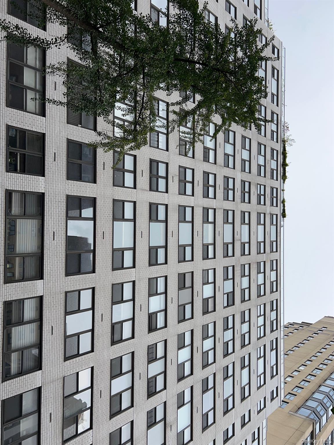 420 East 51st Street, Unit 8DE Manhattan, NY 10022 - Photo 2 of 17 a front view of a building