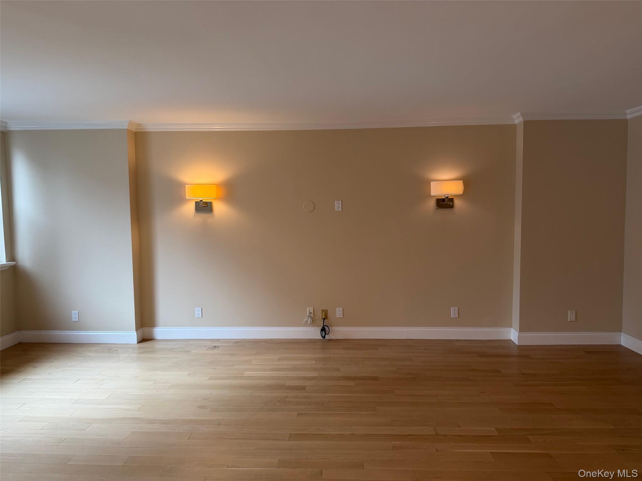 420 East 51st Street, Unit 8DE Manhattan, NY 10022 - Photo 4 of 17 a view of a room with wooden floor