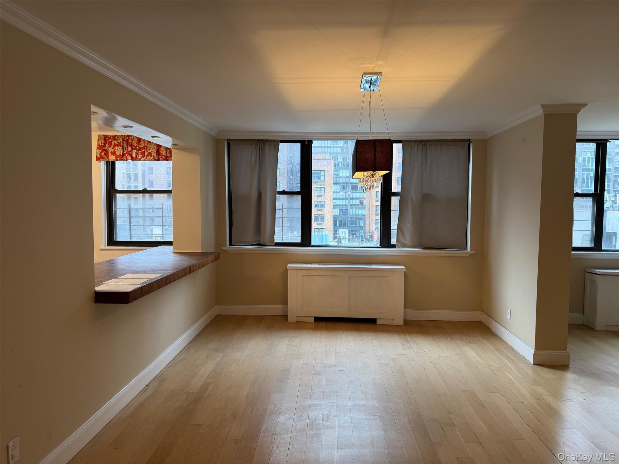 420 East 51st Street, Unit 8DE Manhattan, NY 10022 - Photo 7 of 17 a view of an empty room with a window