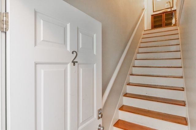 a view of livingroom with furniture and wooden floor