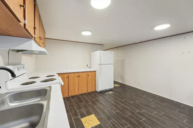 a view of storage and utility room with washer and dryer