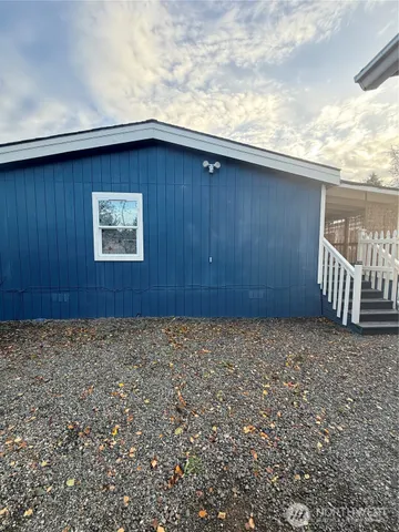 a view of a house with a wooden door