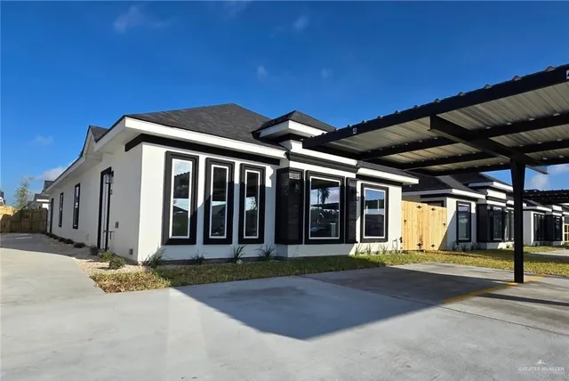 a front view of building with street view