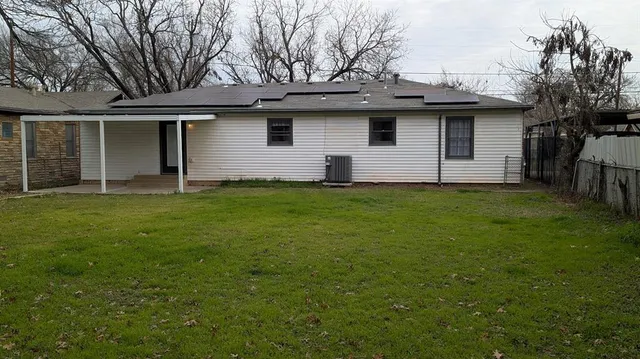 a view of a backyard with a garden