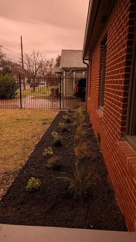 a view of a backyard of the house