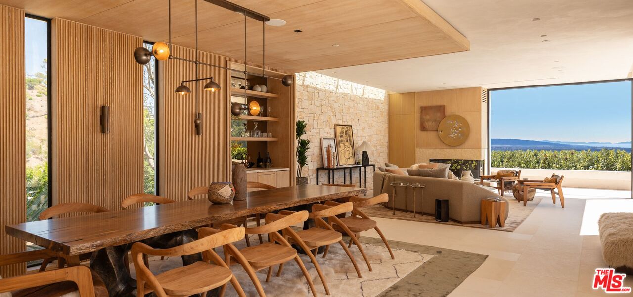 1039 Wallace Ridge Beverly Hills, CA 90210 - Photo 14 of 56 a very nice looking room with a large window and furniture