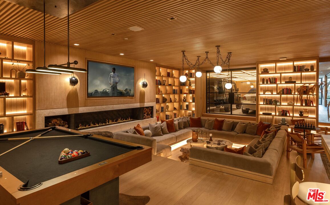 1039 Wallace Ridge Beverly Hills, CA 90210 - Photo 33 of 56 a room with furniture