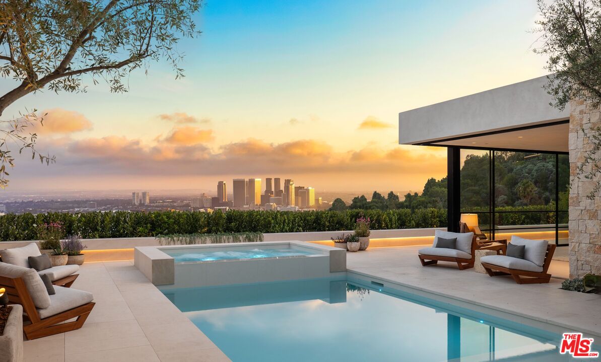 1039 Wallace Ridge Beverly Hills, CA 90210 - Photo 40 of 56 a view of swimming pool with seating area and lake view