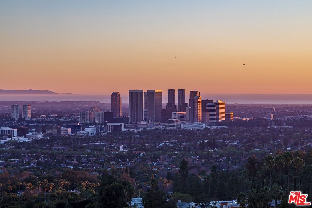 1039 Wallace Ridge Beverly Hills, CA 90210 - Photo 41 of 56 a view of a city with tall buildings in the background