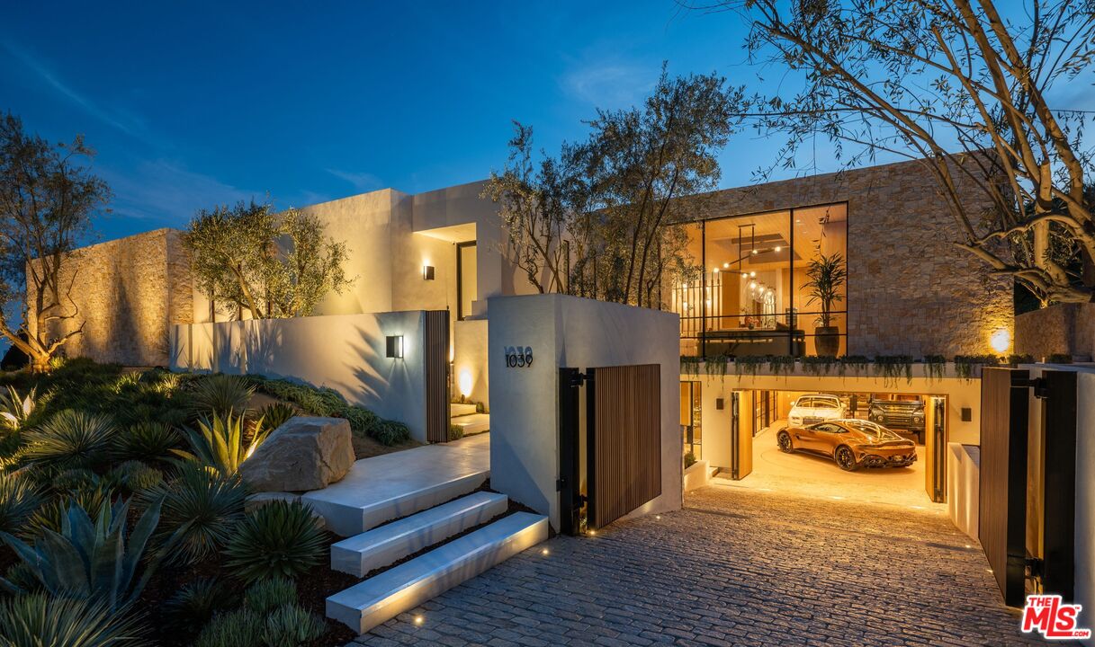 1039 Wallace Ridge Beverly Hills, CA 90210 - Photo 47 of 56 a view of balcony with two chairs and a potted plant