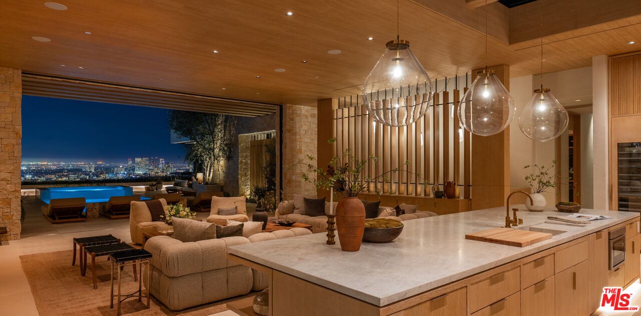 1039 Wallace Ridge Beverly Hills, CA 90210 - Photo 49 of 56 a kitchen with a sink cabinets and living room view