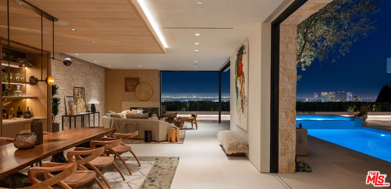 1039 Wallace Ridge Beverly Hills, CA 90210 - Photo 53 of 56 a living room with furniture and a flat screen tv