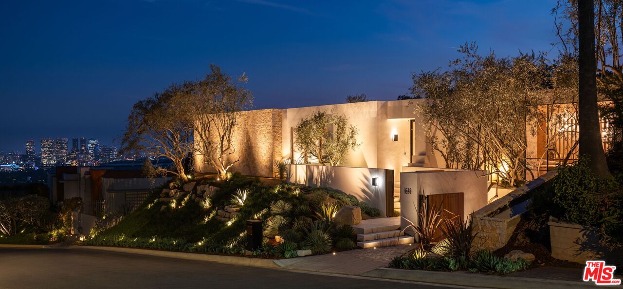 1039 Wallace Ridge Beverly Hills, CA 90210 - Photo 56 of 56 a street view with tall buildings