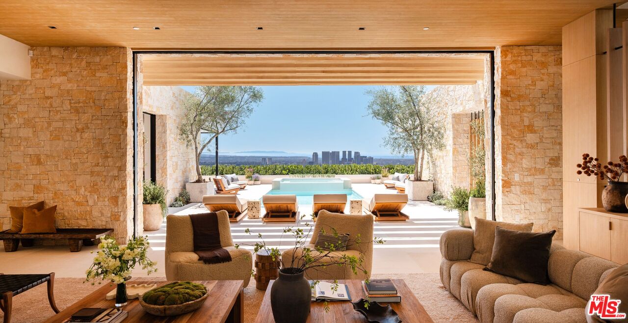 1039 Wallace Ridge Beverly Hills, CA 90210 - Photo 8 of 56 a living room with furniture and a large window