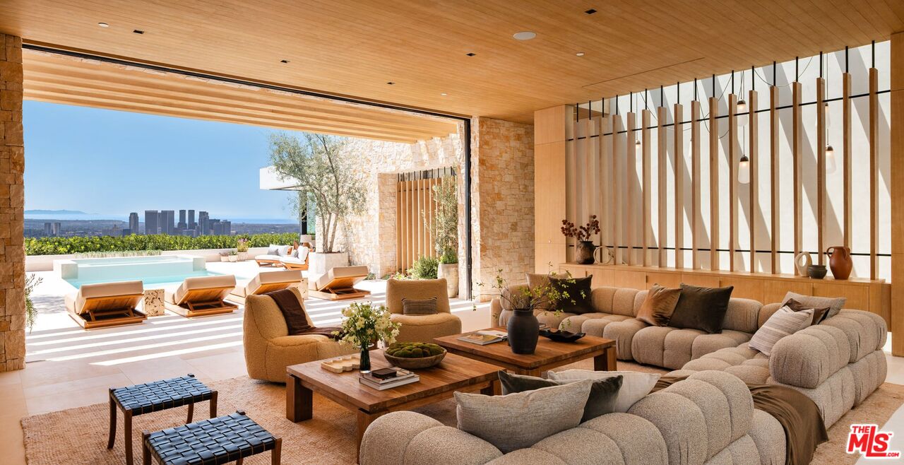 1039 Wallace Ridge Beverly Hills, CA 90210 - Photo 9 of 56 a living room with furniture and a large window
