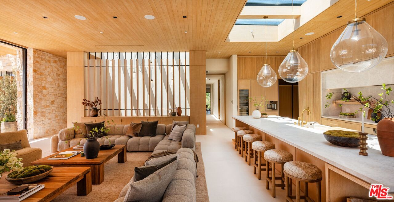 1039 Wallace Ridge Beverly Hills, CA 90210 - Photo 10 of 56 a large living room with large windows